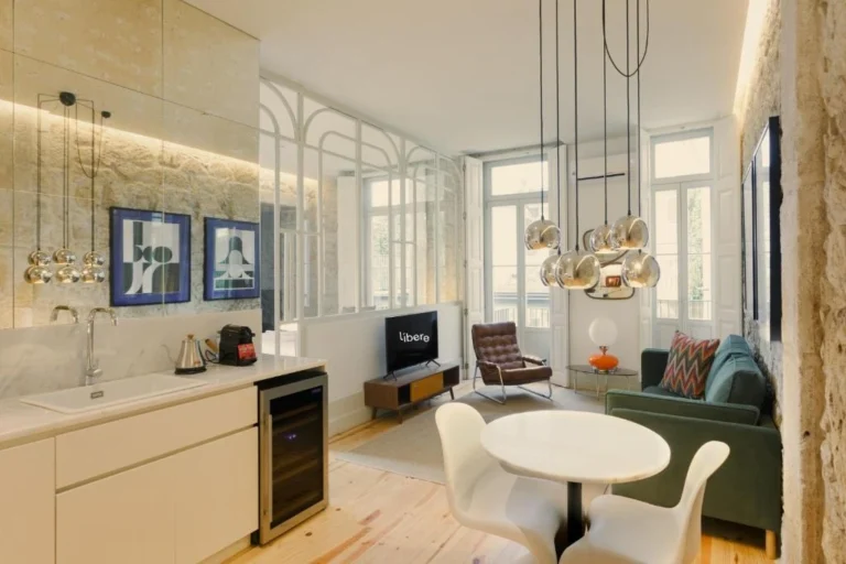 Modern apartment interior with kitchen, living area, stylish lighting, and large windows. Cozy and elegant design.